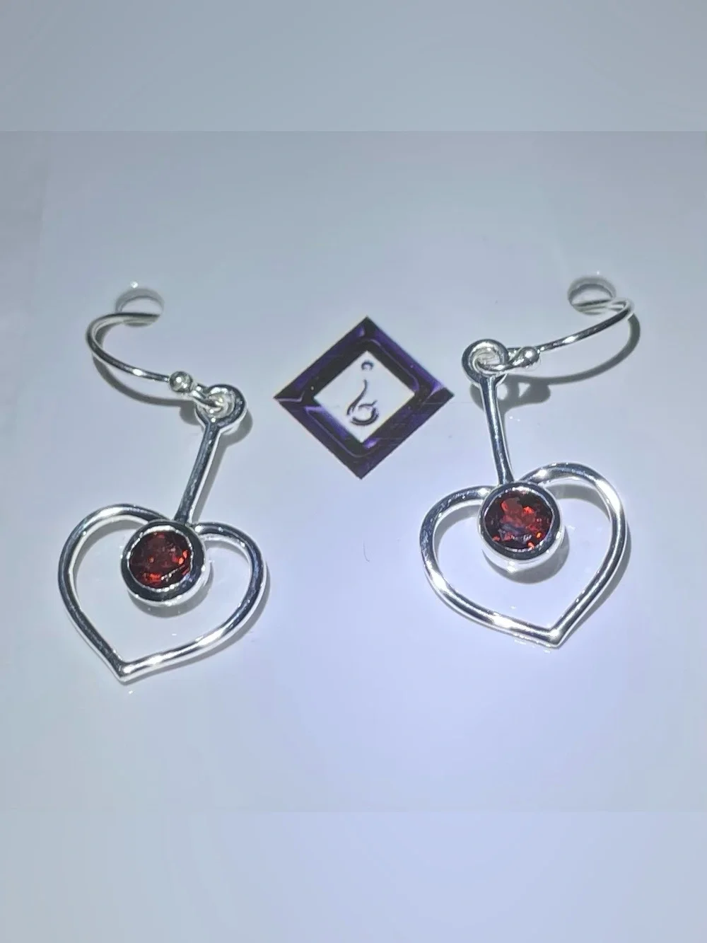 Garnet heart dangle earrings